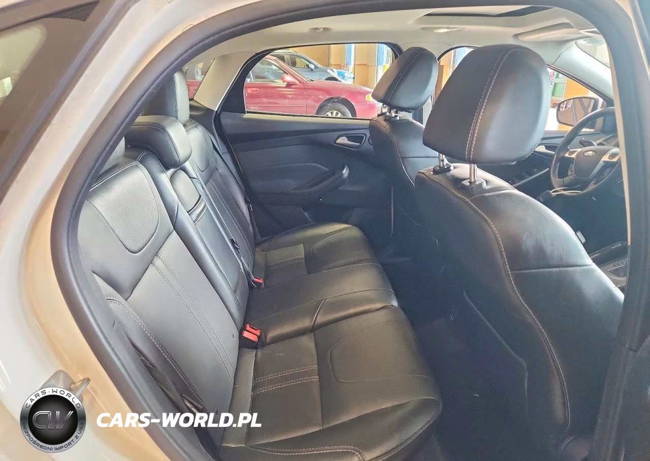 2013 Ford Focus Titanium VIN:1FADP3J28DL368094 - 10
