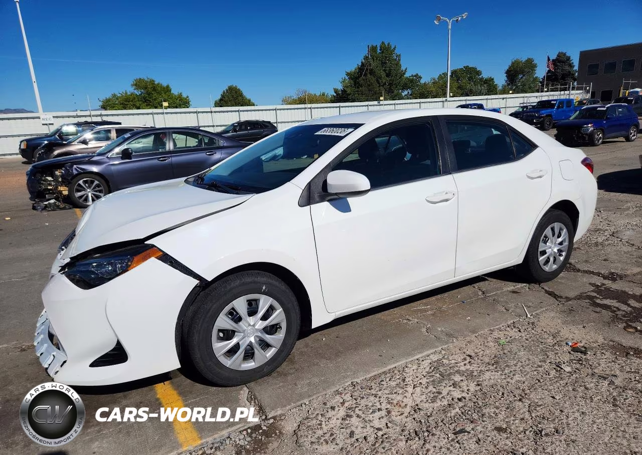 2018 Toyota Corolla L VIN:5YFBURHE3JP790211 - 1