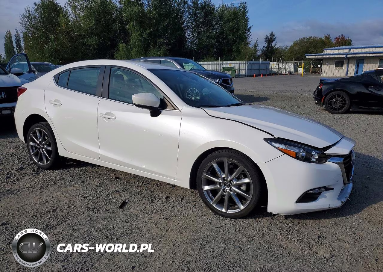2018 Mazda 3 Touring VIN:3MZBN1V33JM210557 - 4
