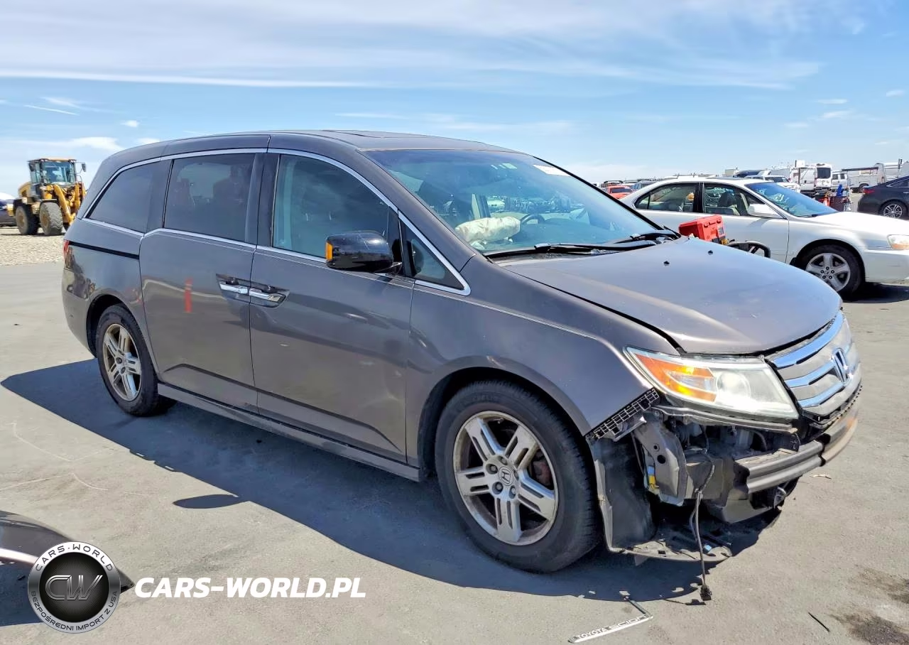 2012 Honda Odyssey Touring VIN:5FNRL5H97CB087772 - 4