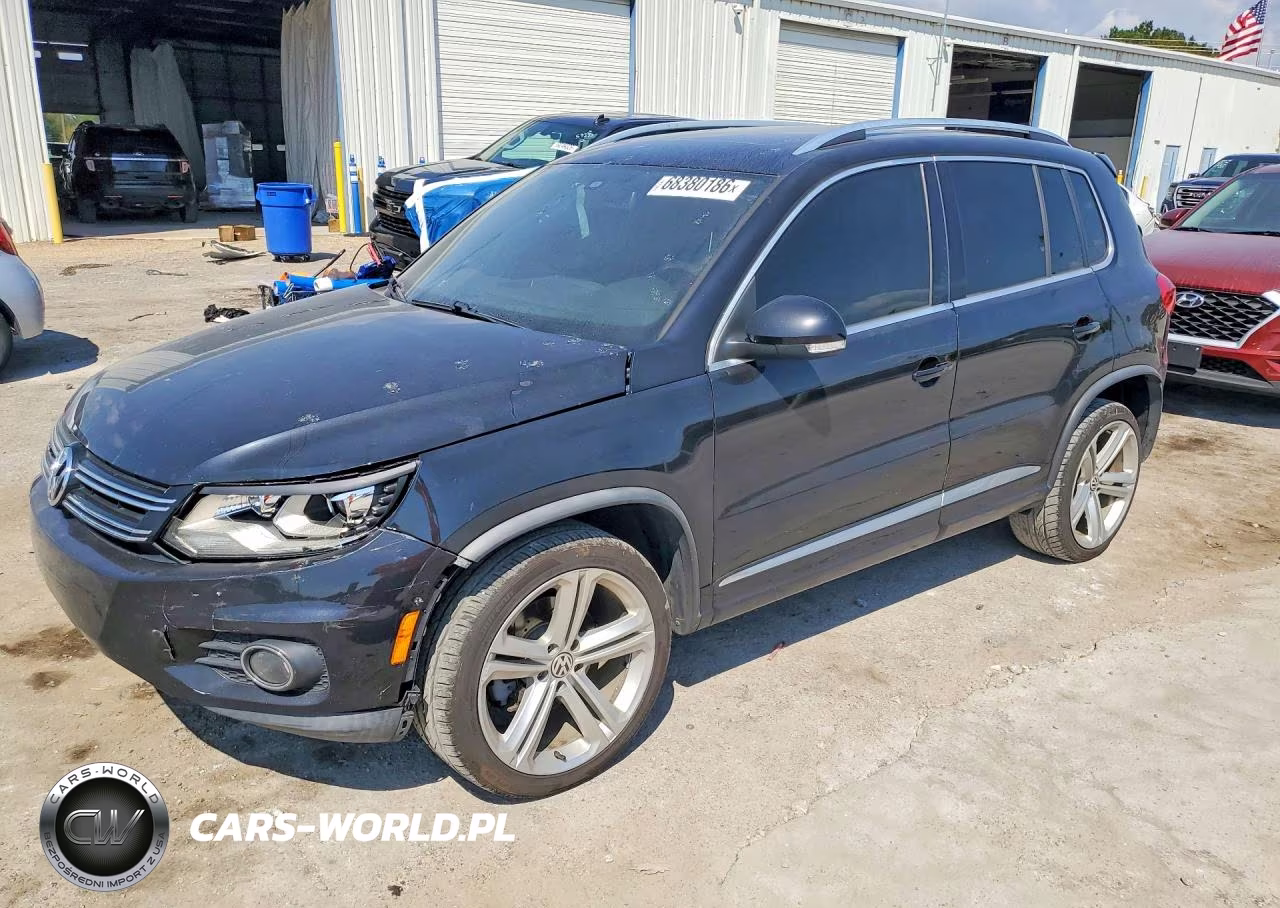 2014 Volkswagen Tiguan S VIN:WVGBV3AX3EW068476 - 1