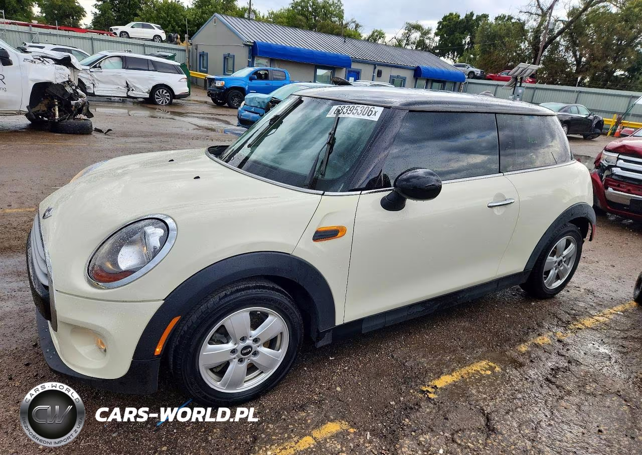 2015 Mini Cooper VIN:WMWXM5C57FT941005 - 1