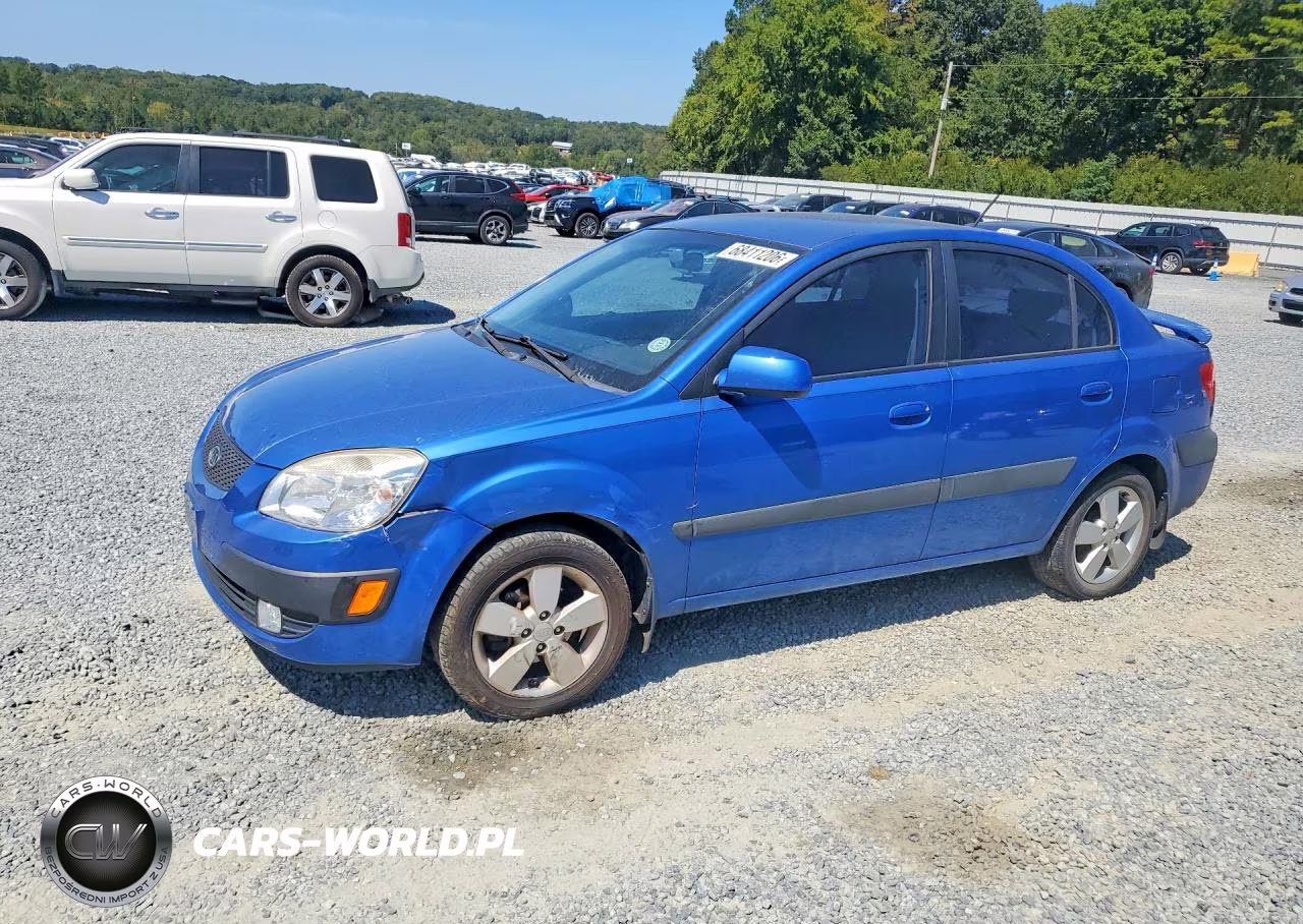 2009 Kia Rio Base VIN:KNADE223596564532 - 1