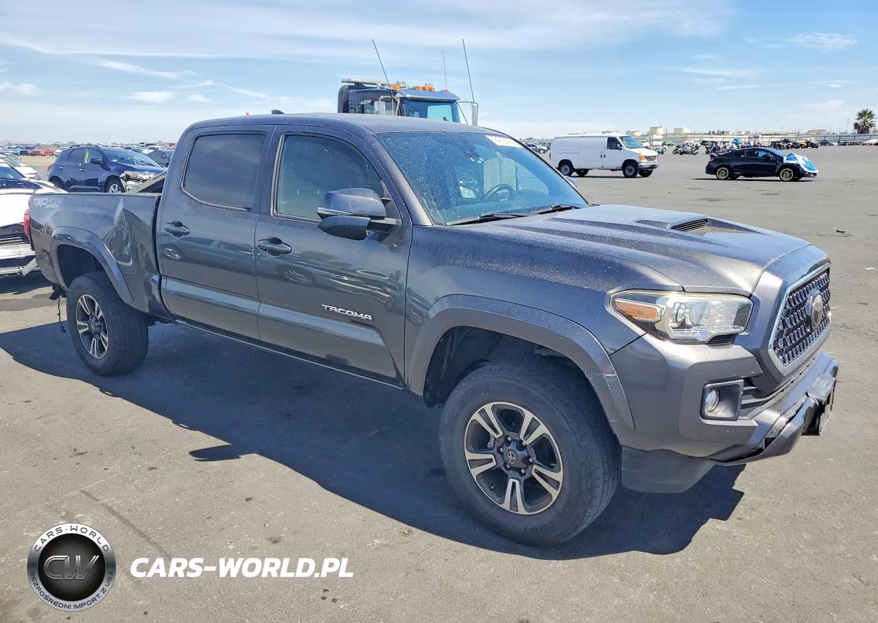 2018 Toyota Tacoma Trd Sport VIN:3TMDZ5BN4JM047852 - 4