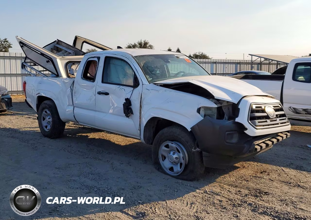 2018 Toyota Tacoma Sr VIN:5TFRX5GN4JX123018 - 4