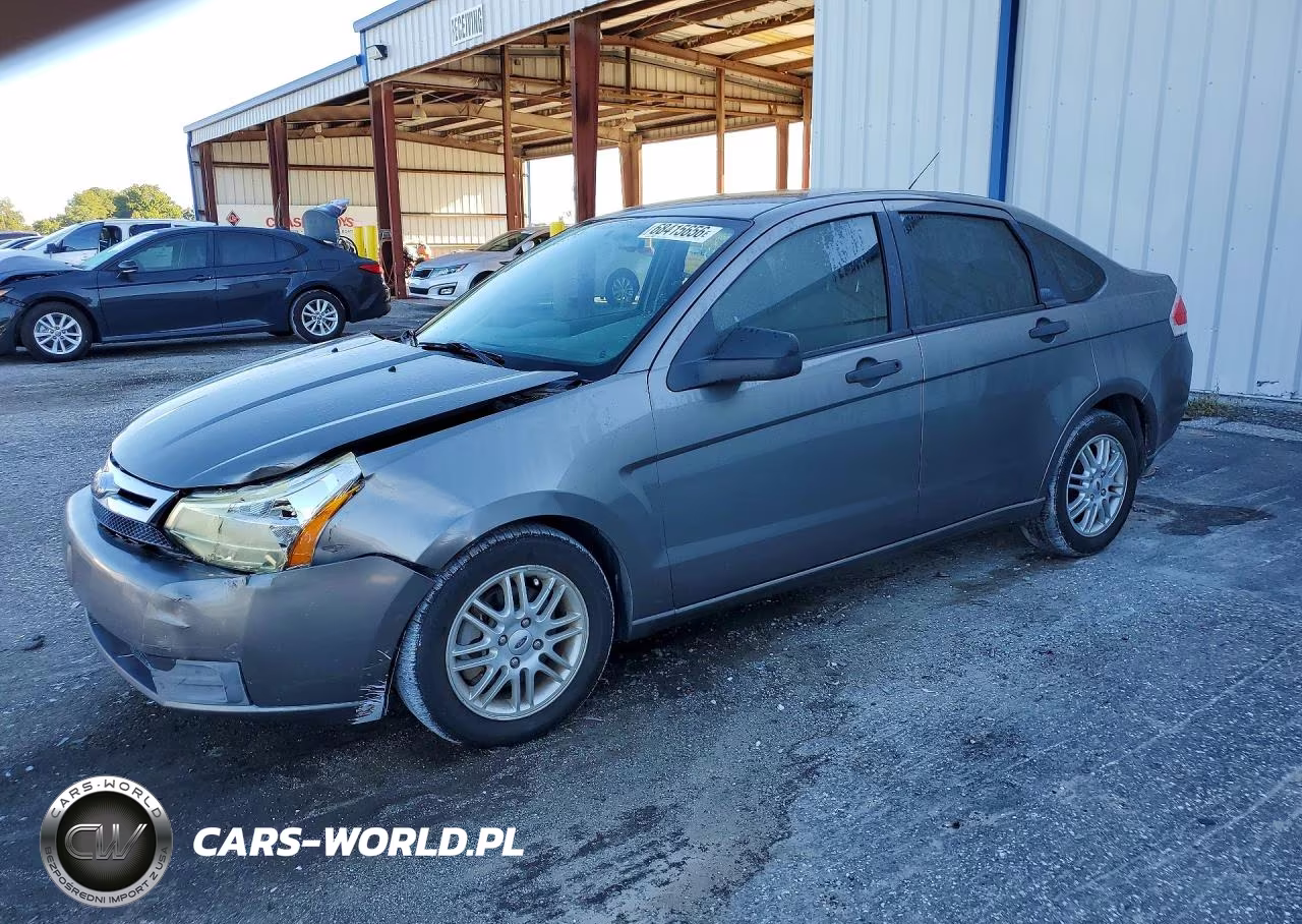 2009 Ford Focus Se VIN:1FAHP35N29W153340 - 1
