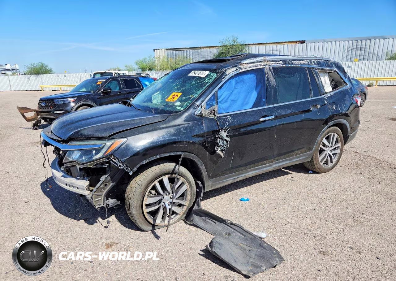 2016 Honda Pilot Touring VIN:5FNYF5H90GB034131 - 1