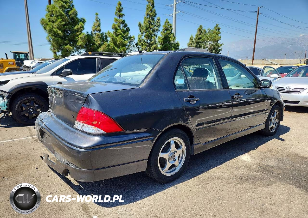 2002 Mitsubishi Lancer Oz Rally VIN:JA3AJ86E72U080765 - 3