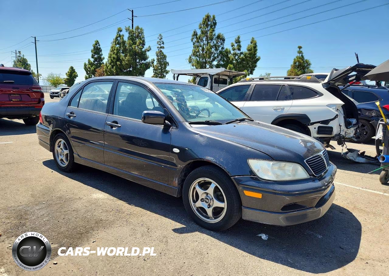 2002 Mitsubishi Lancer Oz Rally VIN:JA3AJ86E72U080765 - 4