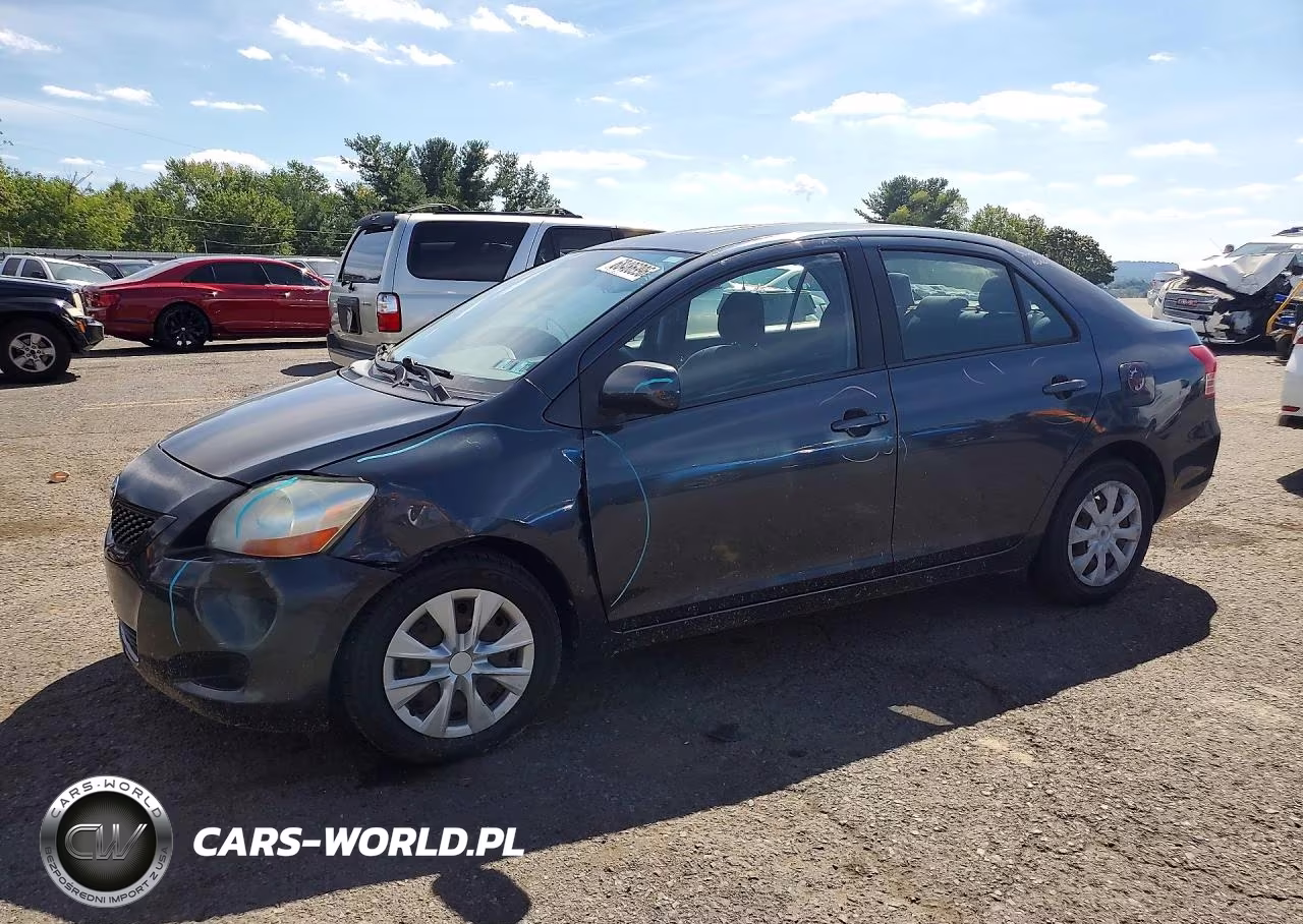 2011 Toyota Yaris Base VIN:JTDBT4K30B1409112 - 1