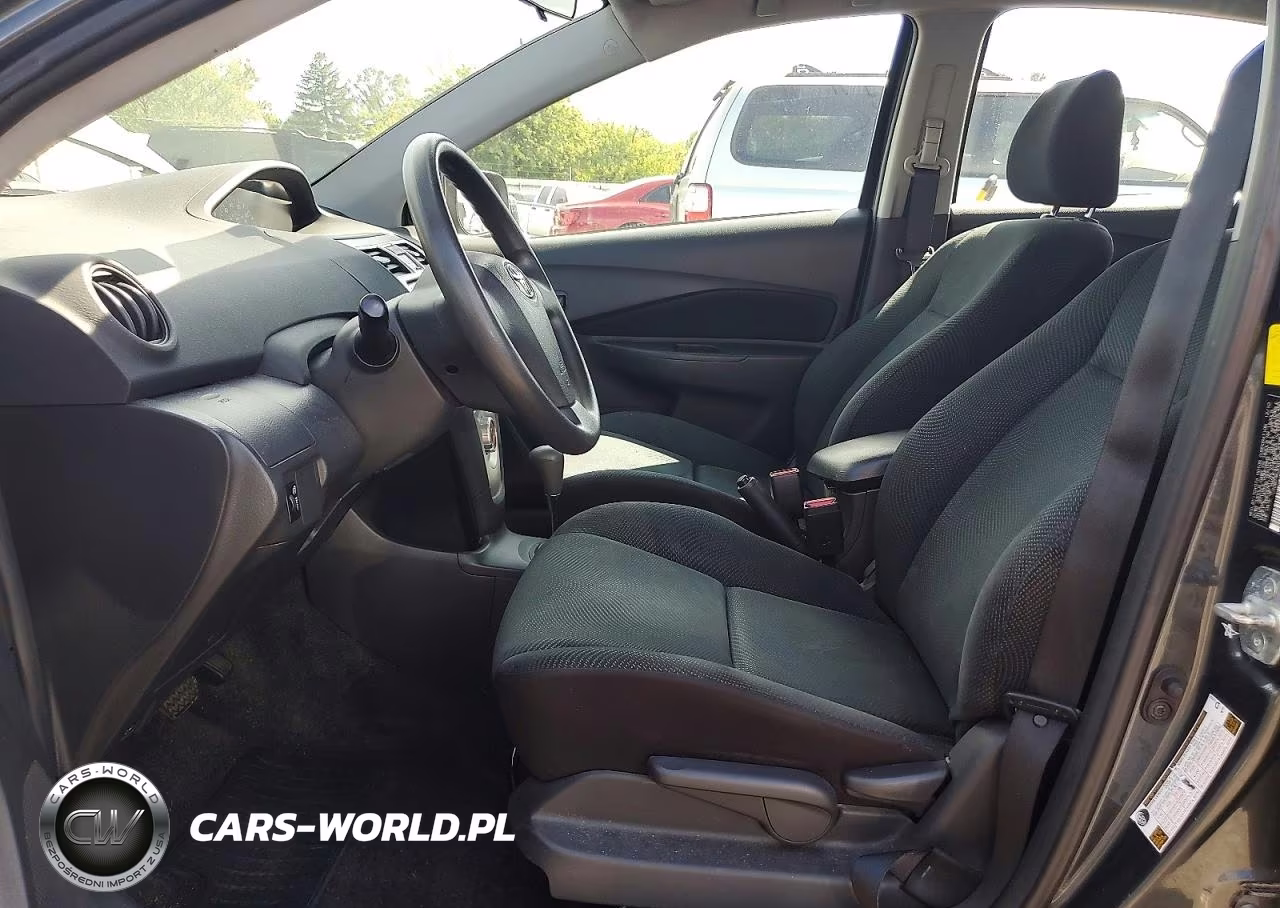 2011 Toyota Yaris Base VIN:JTDBT4K30B1409112 - 7