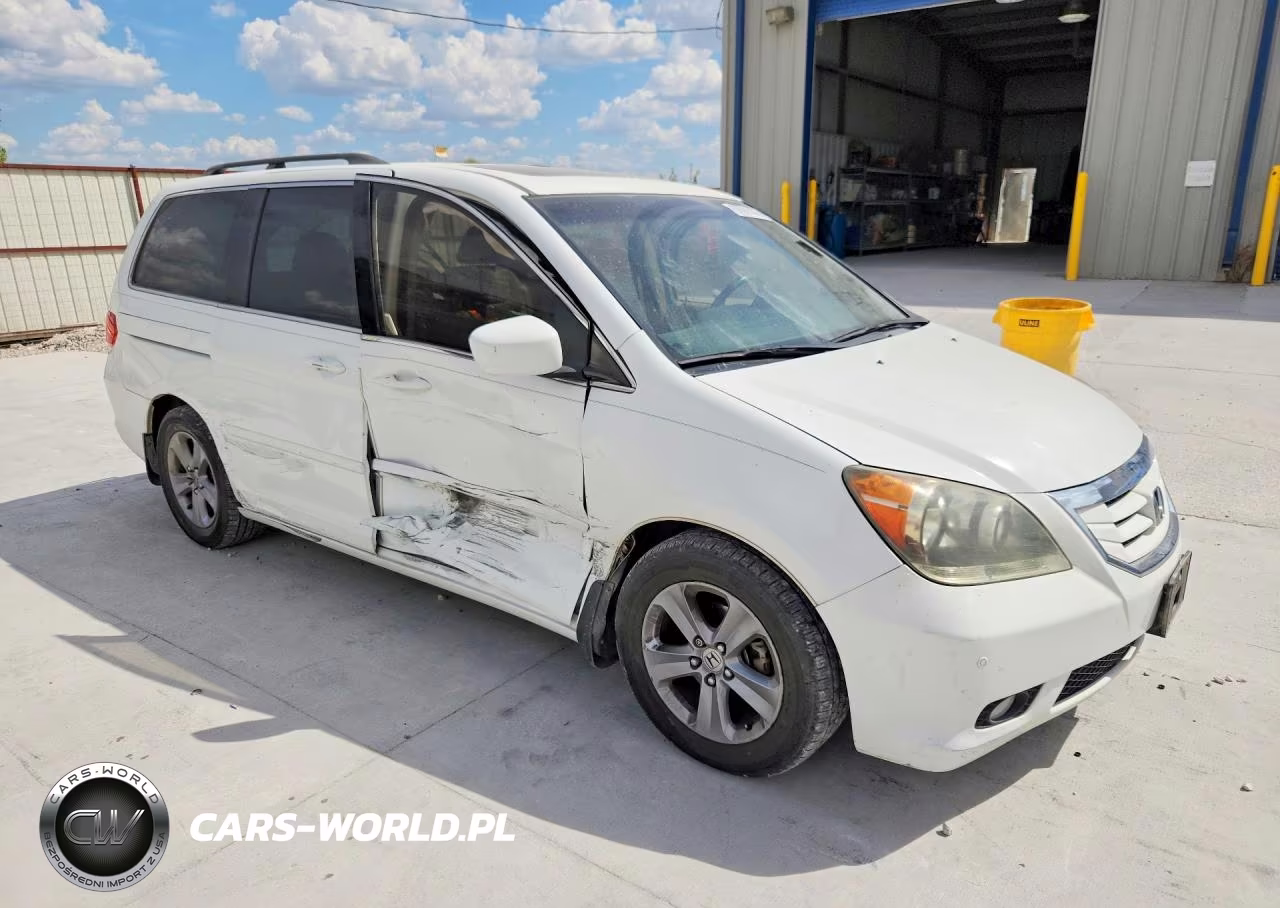 2010 Honda Odyssey Touring VIN:5FNRL3H92AB055183 - 4