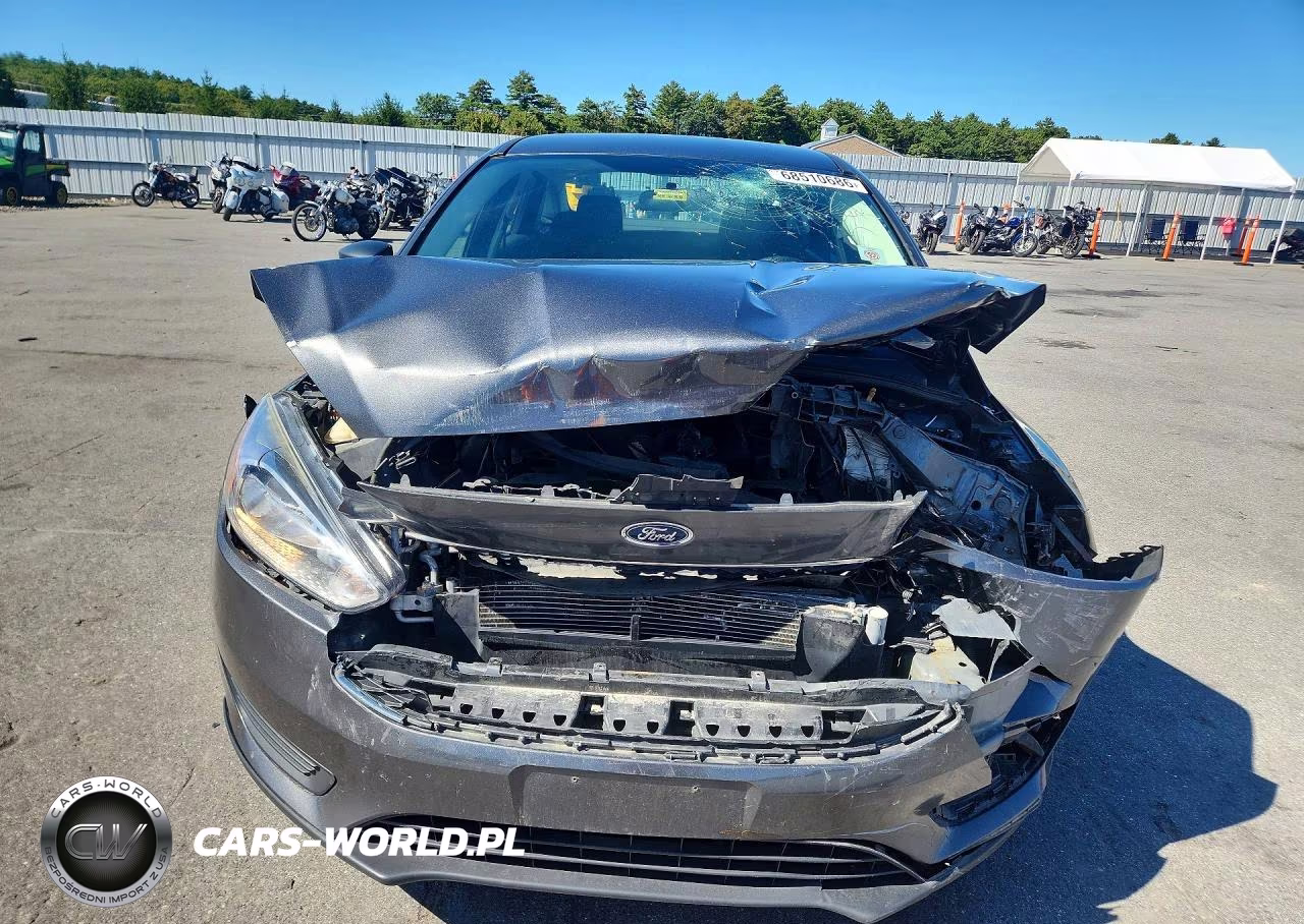 2017 Ford Focus S VIN:1FADP3E26HL326488 - 5