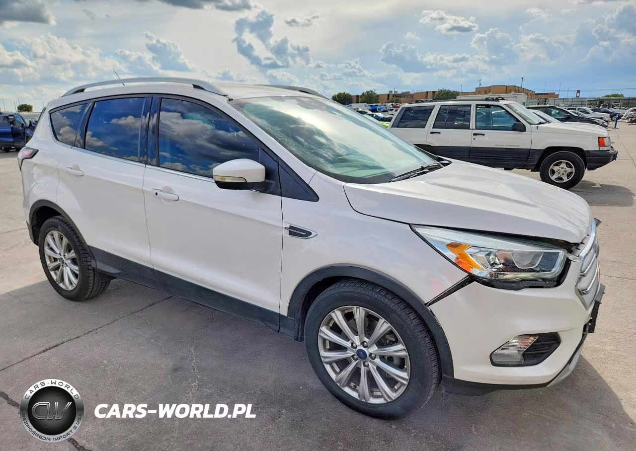2017 Ford Escape Titanium VIN:1FMCU0J90HUD40151 - 4