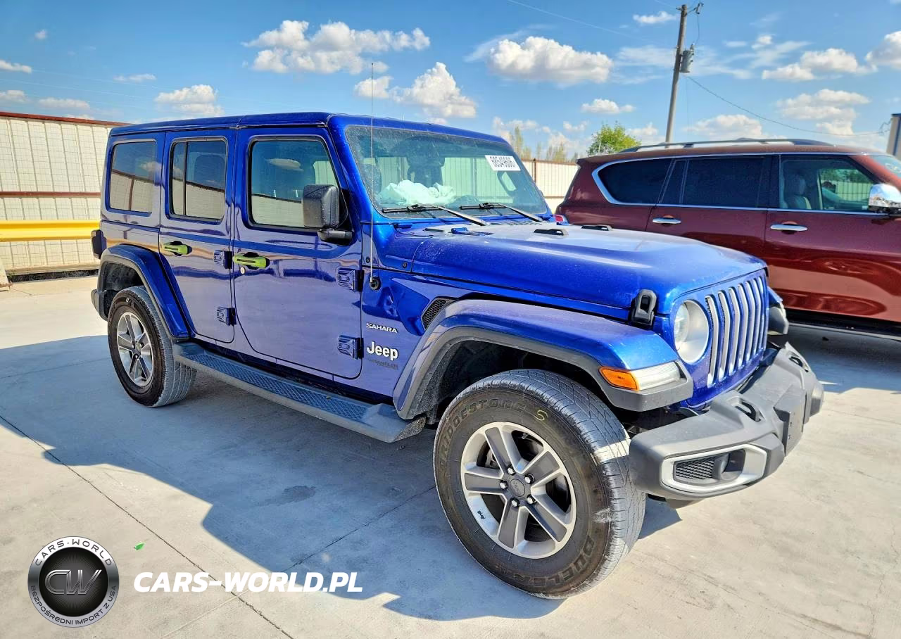 2019 Jeep Wrangler Unlimited Sahara VIN:1C4HJXEN3KW620239 - 4