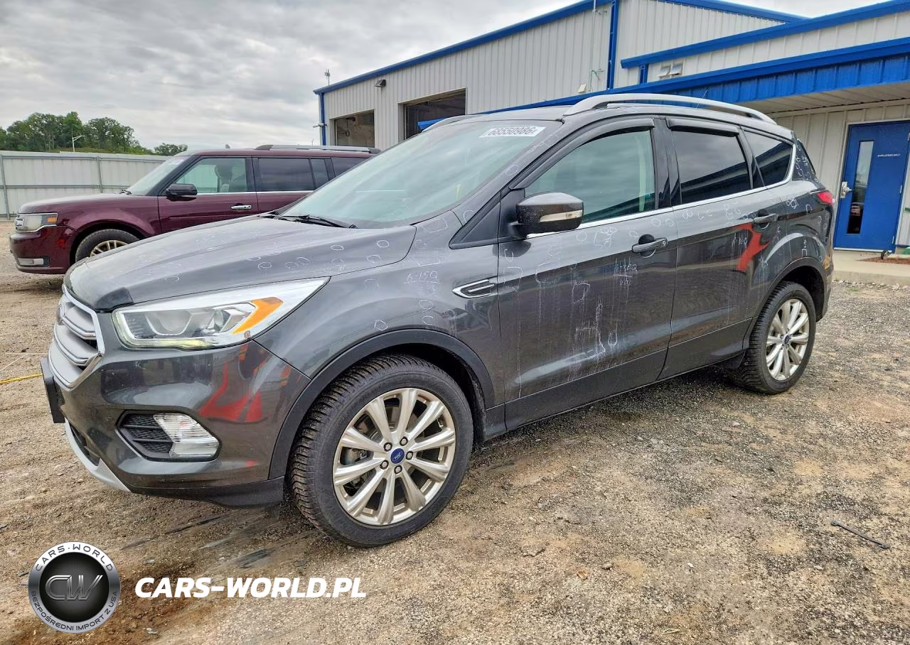 2017 Ford Escape Titanium VIN:1FMCU9J94HUA90157 - 1