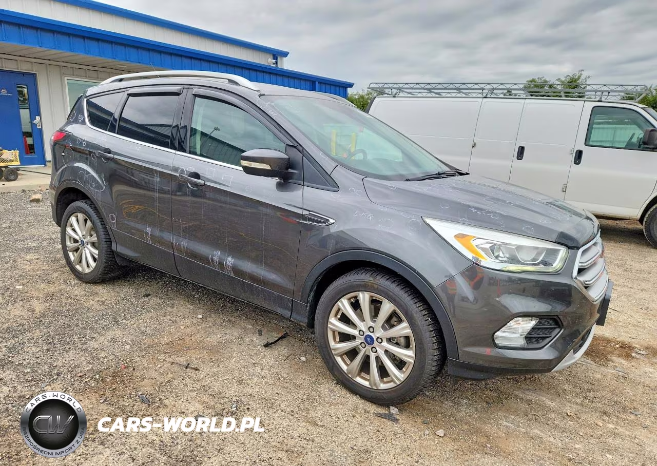 2017 Ford Escape Titanium VIN:1FMCU9J94HUA90157 - 4