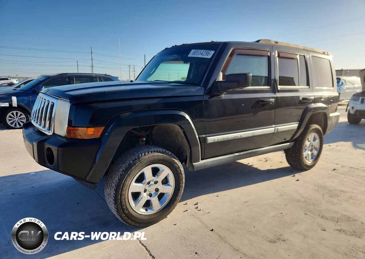 2009 Jeep Commander Sport VIN:1J8HH48K89C512876 - 1
