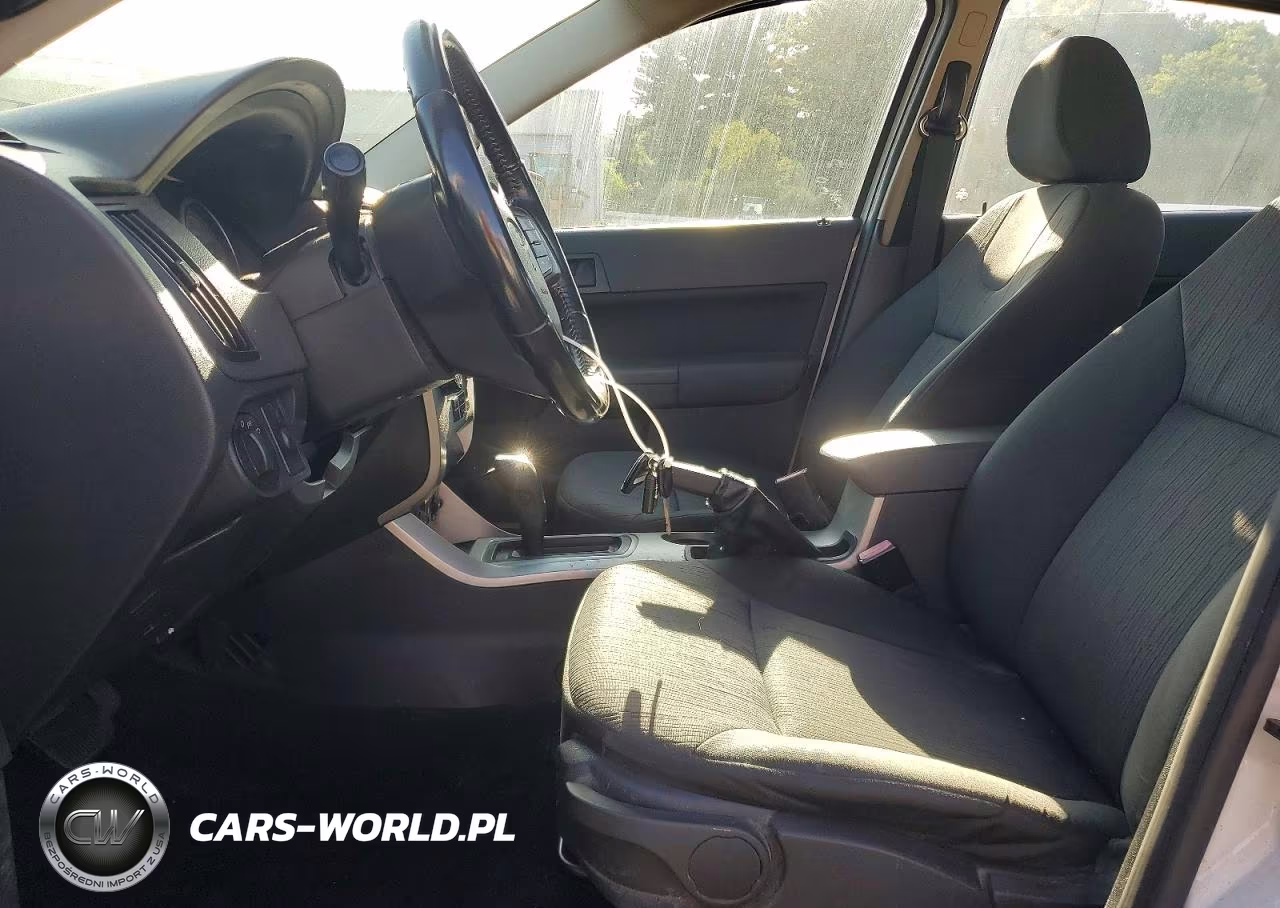 2009 Ford Focus Se VIN:1FAHP35N39W135901 - 7