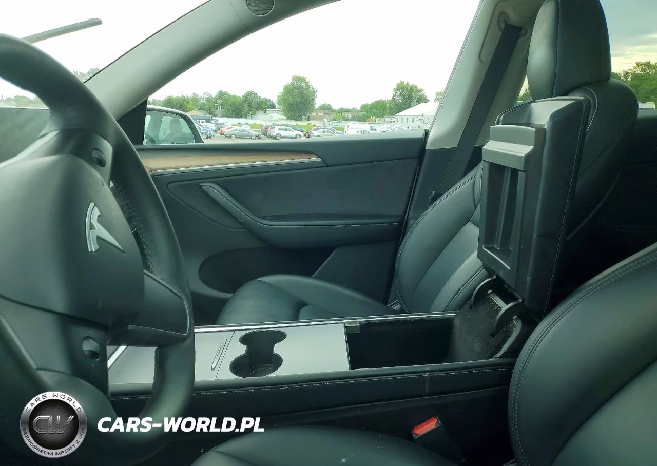 2023 Tesla Model Y VIN:7SAYGDEE0PA128941 - 7