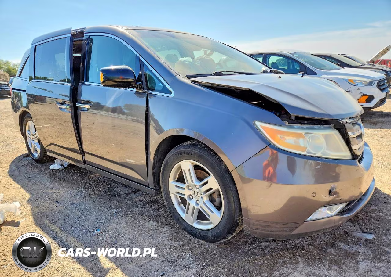 2011 Honda Odyssey Touring VIN:5FNRL5H95BB063940 - 4