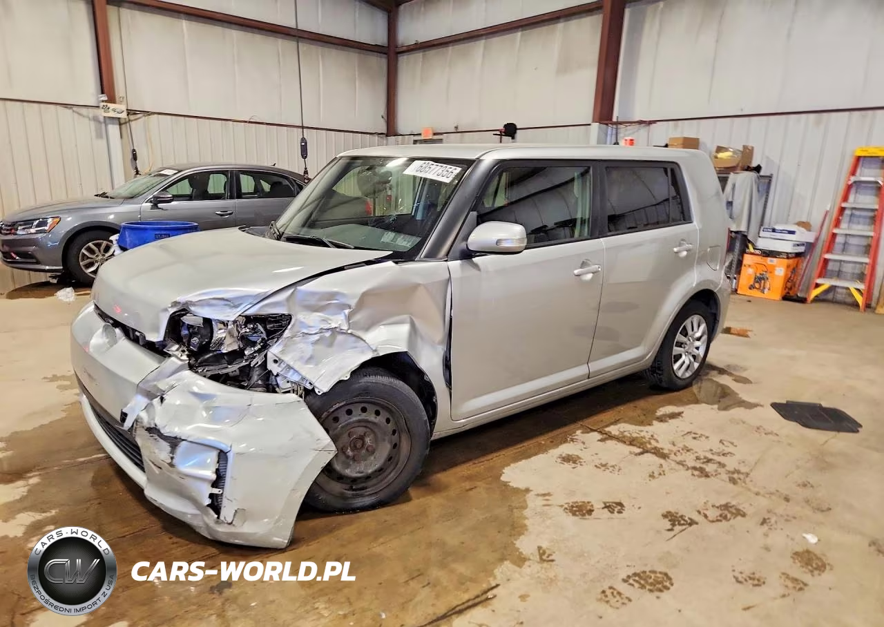 2012 Toyota Scion VIN:JTLZE4FE7CJ025550 - 1