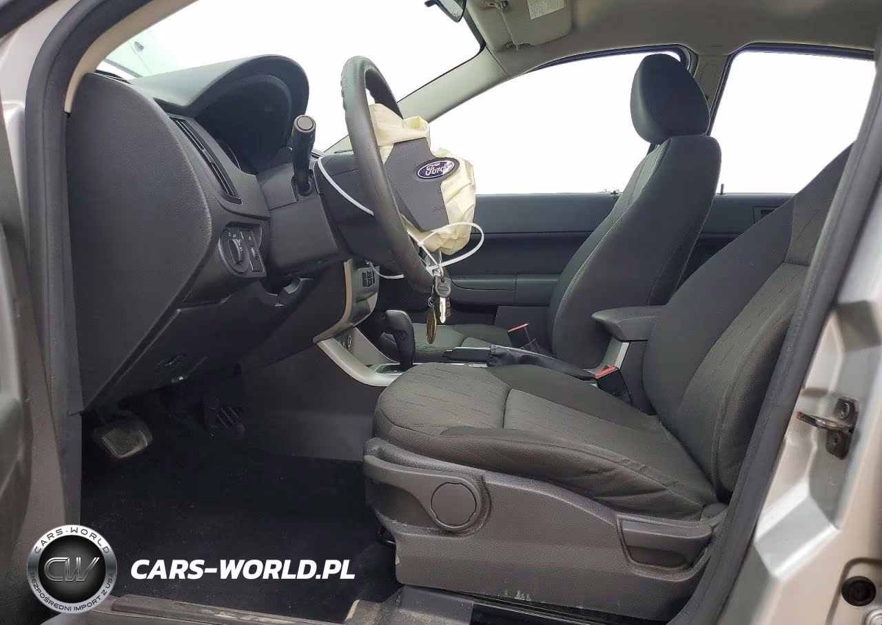 2009 Ford Focus Se VIN:1FAHP35N89W124392 - 7