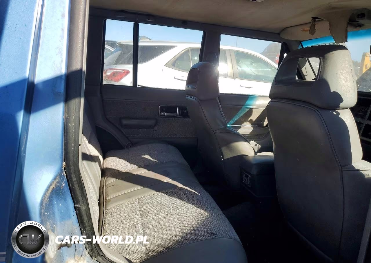 1990 Jeep Cherokee Laredo VIN:1J4FJ58L4LL148491 - 11