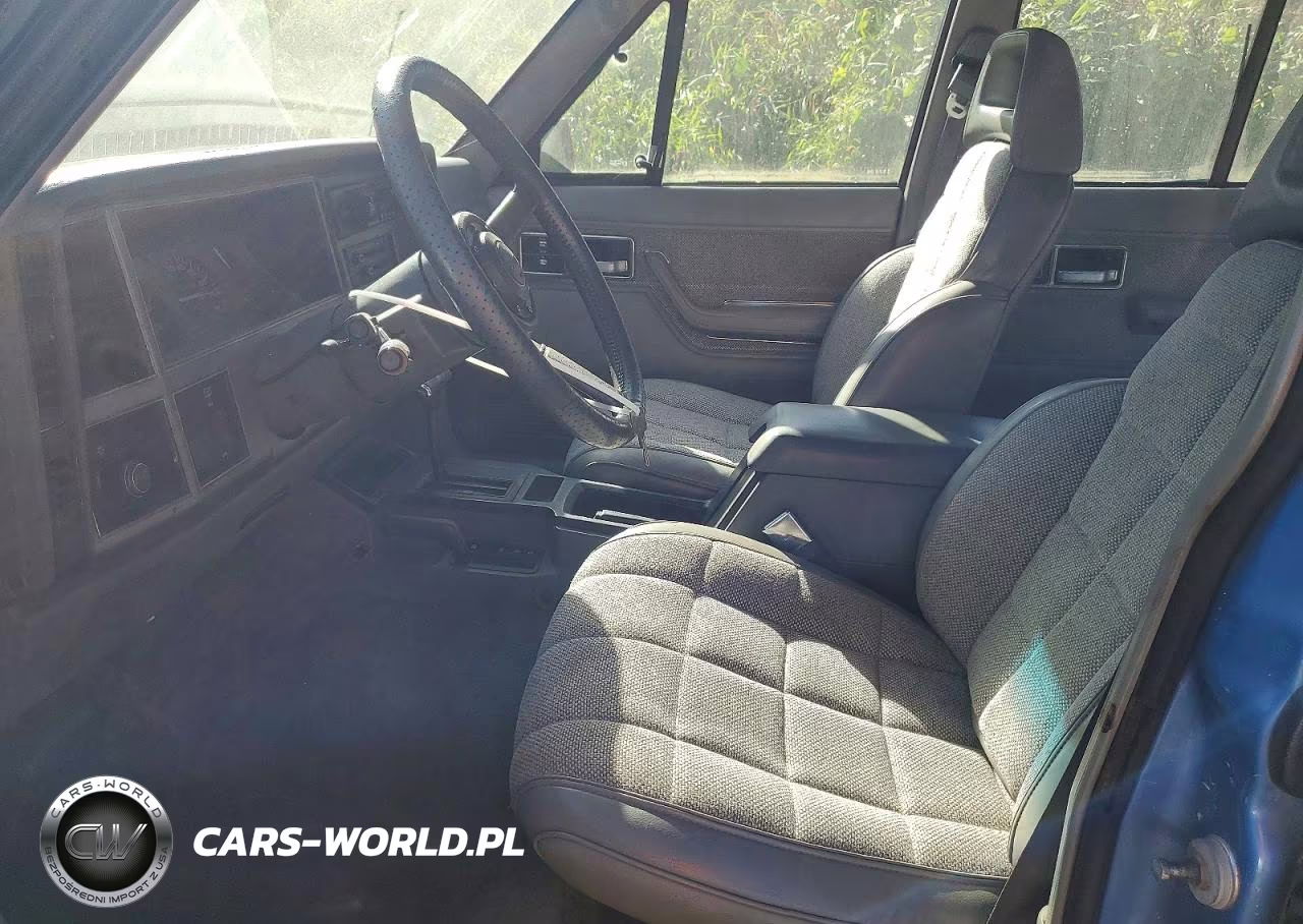1990 Jeep Cherokee Laredo VIN:1J4FJ58L4LL148491 - 7
