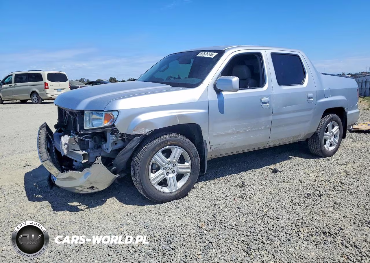 2011 Honda Ridgeline Rtl VIN:5FPYK1F57BB452013 - 1