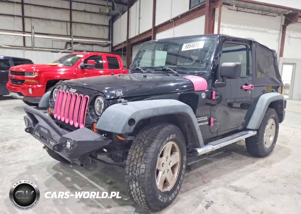 2011 Jeep Wrangler Sport VIN:1J4AA2D13BL576824 - 1