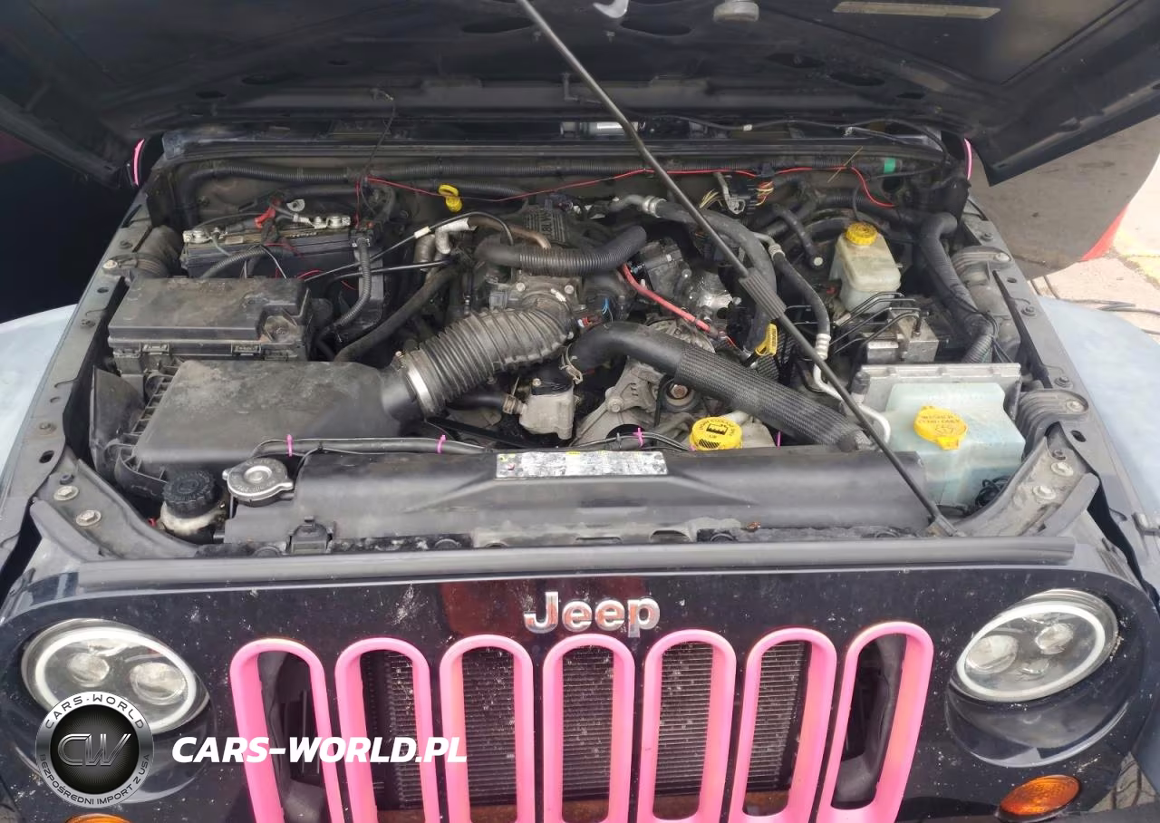 2011 Jeep Wrangler Sport VIN:1J4AA2D13BL576824 - 12