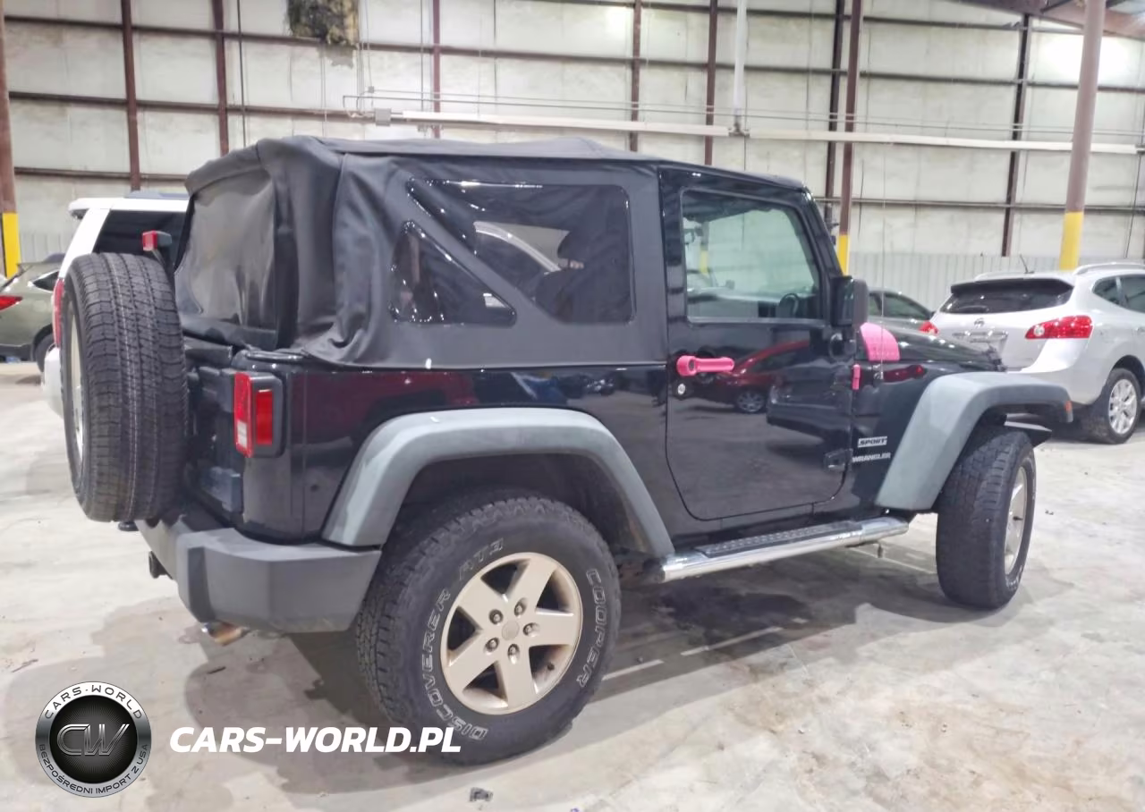 2011 Jeep Wrangler Sport VIN:1J4AA2D13BL576824 - 3