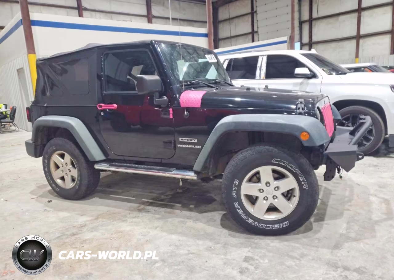 2011 Jeep Wrangler Sport VIN:1J4AA2D13BL576824 - 4