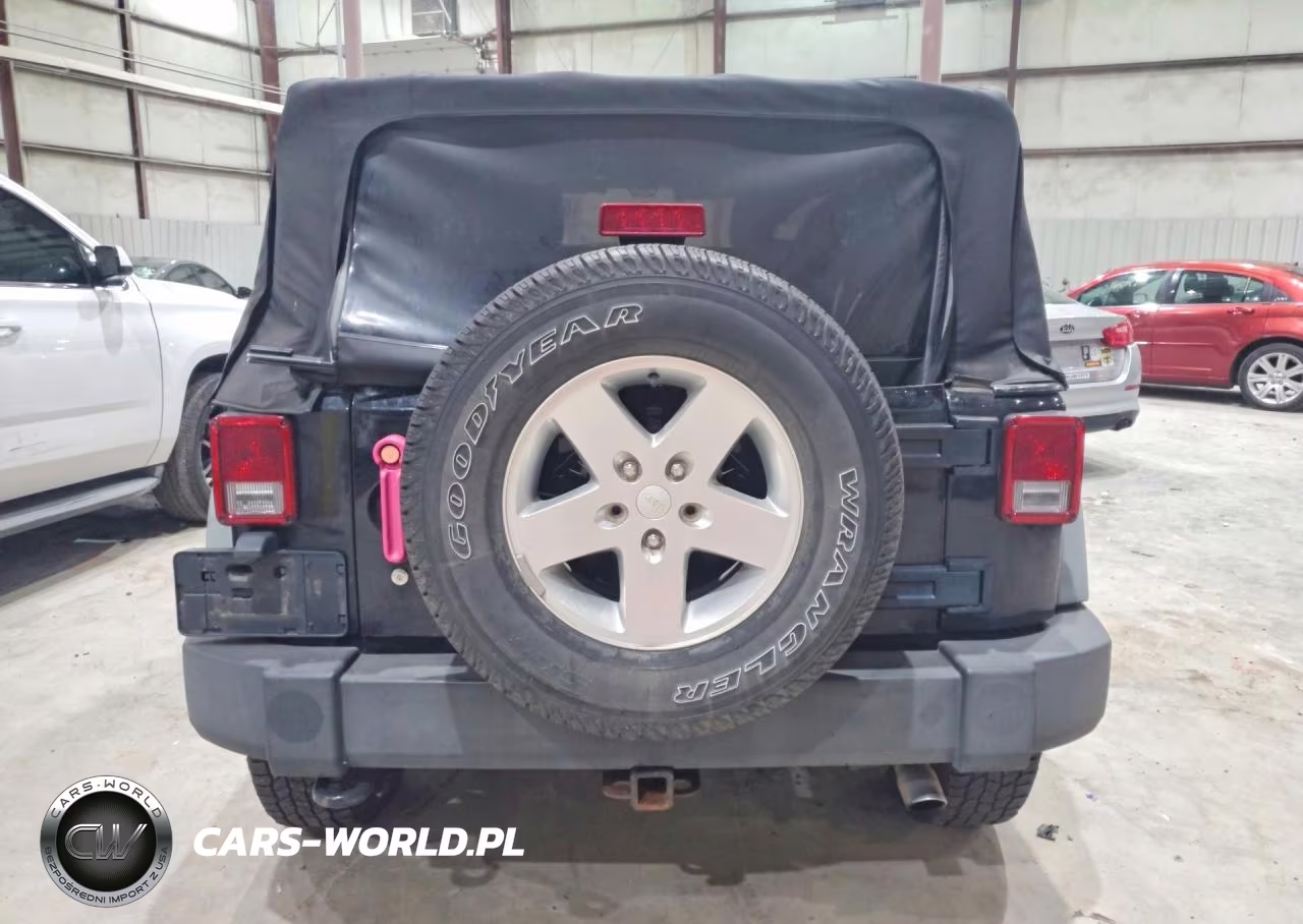 2011 Jeep Wrangler Sport VIN:1J4AA2D13BL576824 - 6