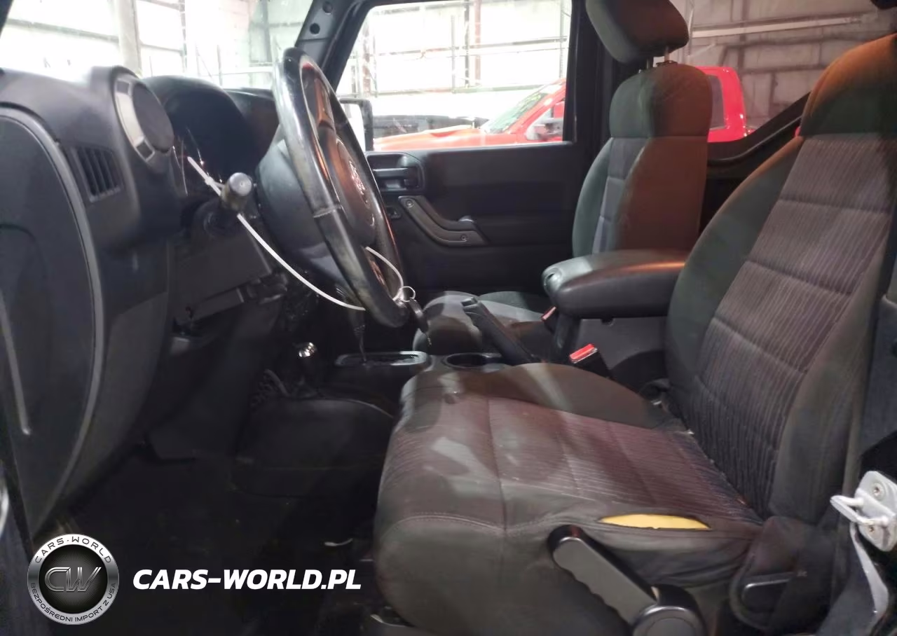 2011 Jeep Wrangler Sport VIN:1J4AA2D13BL576824 - 7