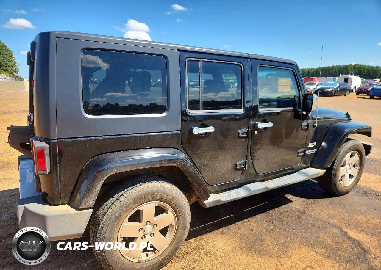 2009 Jeep Wrangler Unlimited Sahara VIN:1J4GA59159L772763 - 3