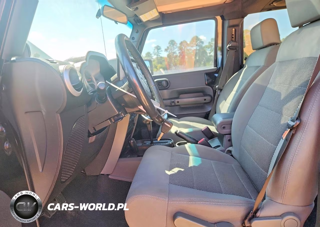 2009 Jeep Wrangler Unlimited Sahara VIN:1J4GA59159L772763 - 7