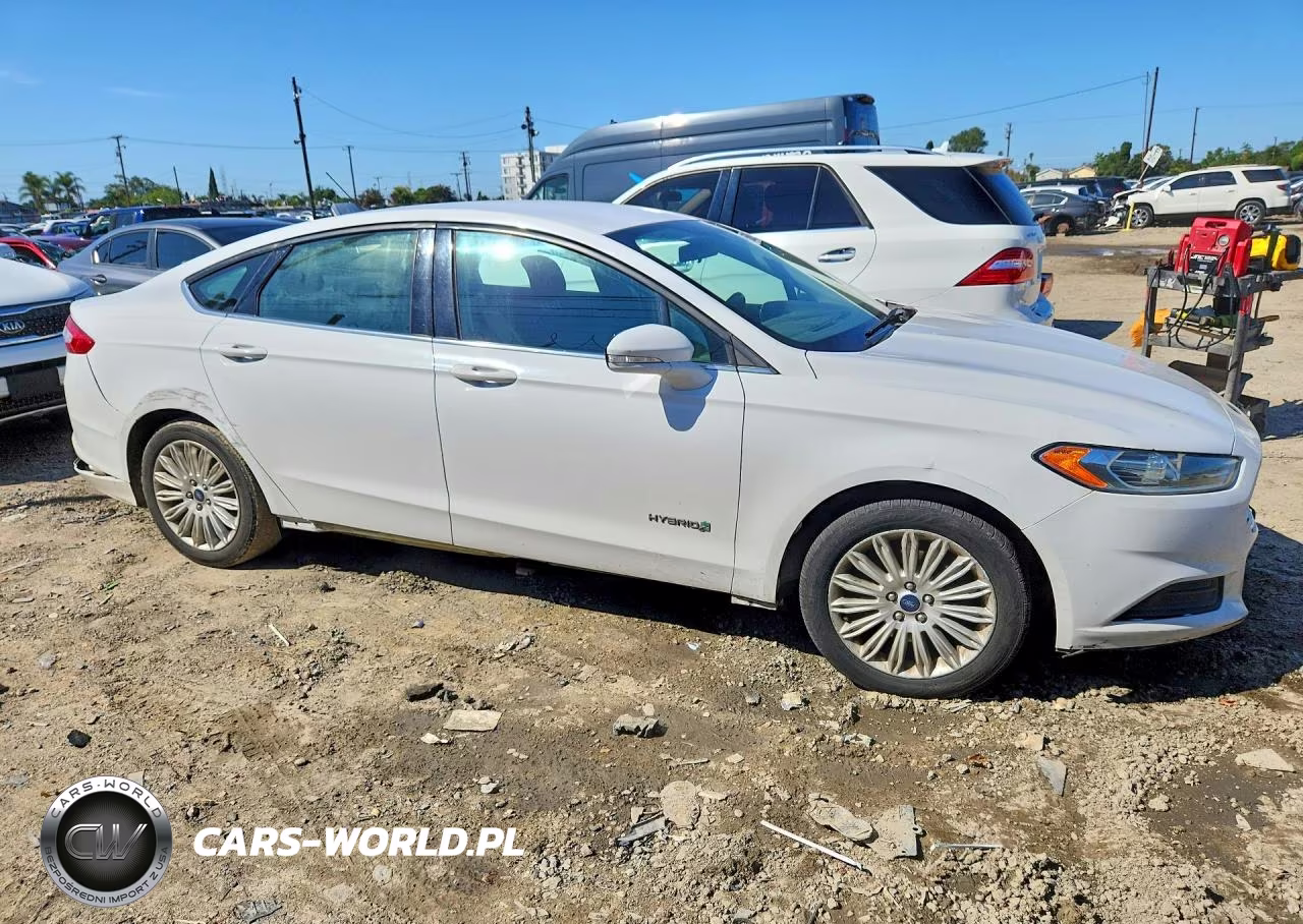 2015 Ford Fusion Se Hybrid VIN:3FA6P0LUXFR228459 - 4