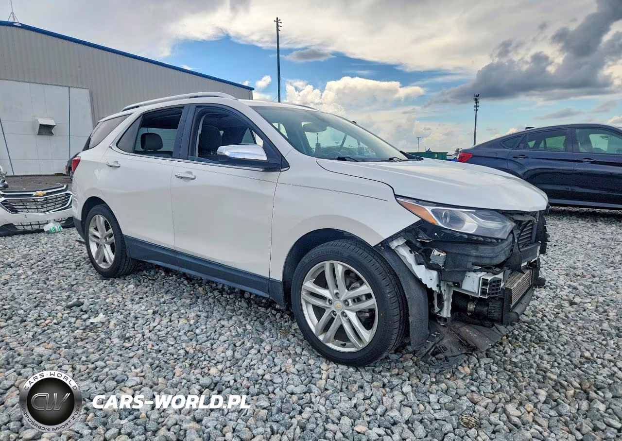 2018 Chevrolet Equinox Premier VIN:2GNAXMEV1J6151912 - 4