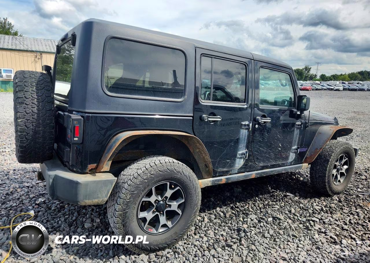 2014 Jeep Wrangler Unlimited Rubicon VIN:1C4BJWFG7EL145104 - 3