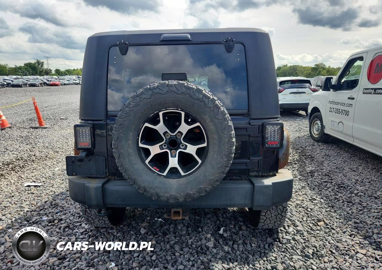 2014 Jeep Wrangler Unlimited Rubicon VIN:1C4BJWFG7EL145104 - 6