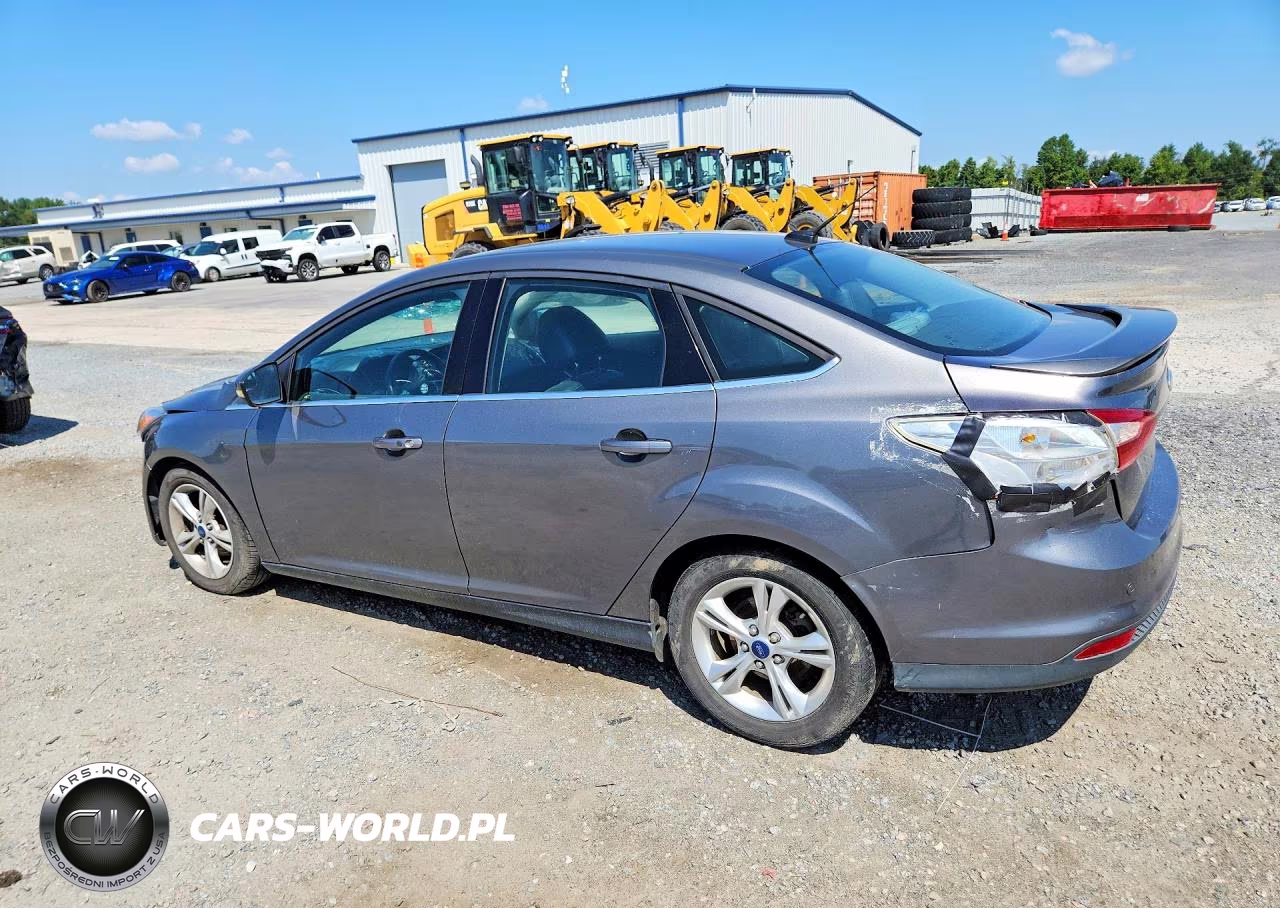 2014 Ford Focus Titanium VIN:1FADP3J26EL399958 - 2