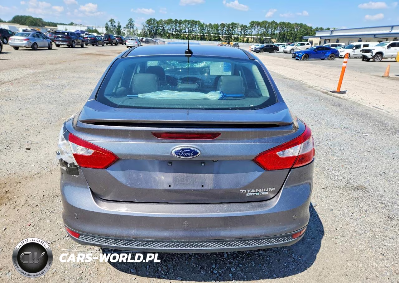 2014 Ford Focus Titanium VIN:1FADP3J26EL399958 - 6