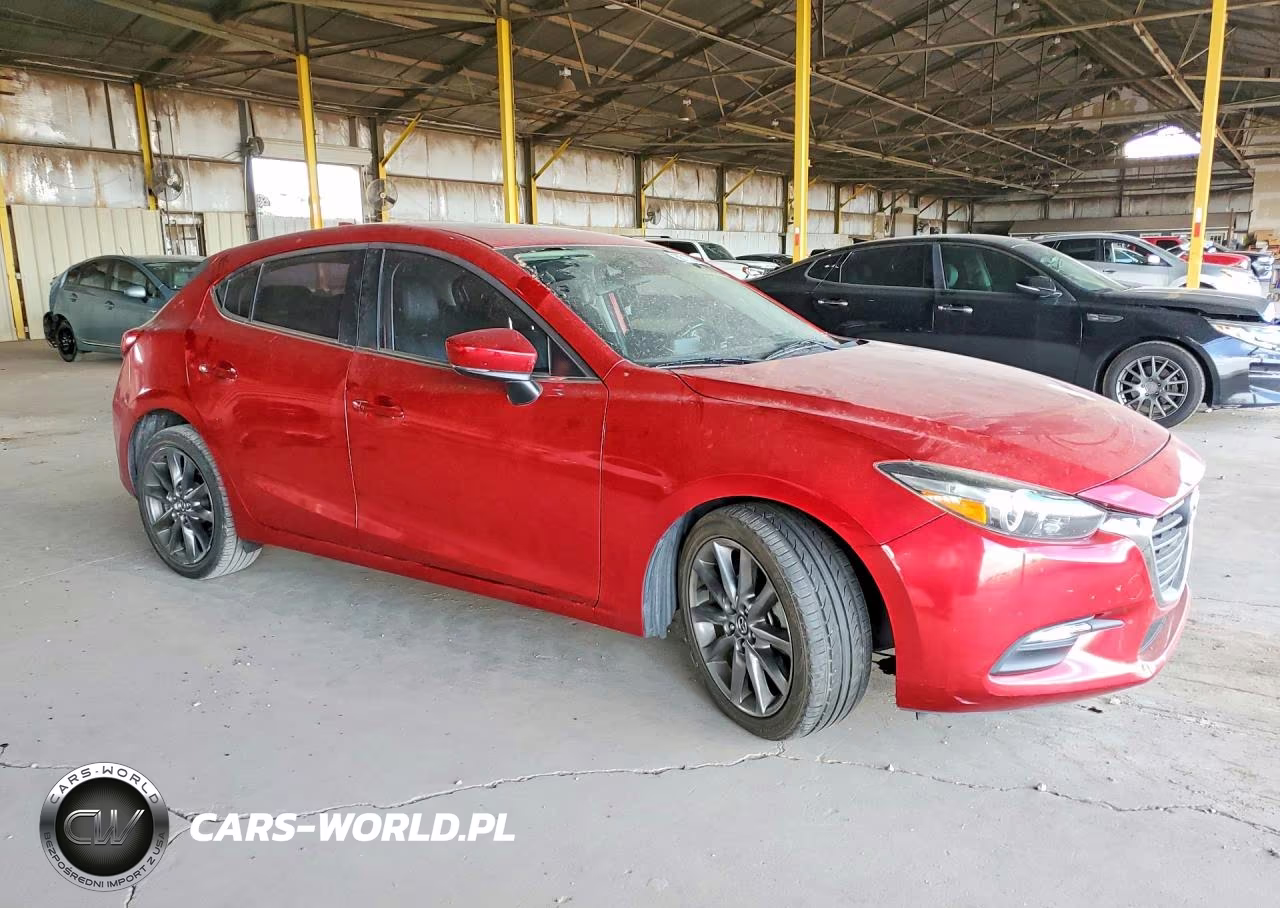 2018 Mazda 3 Touring VIN:3MZBN1L38JM256565 - 4