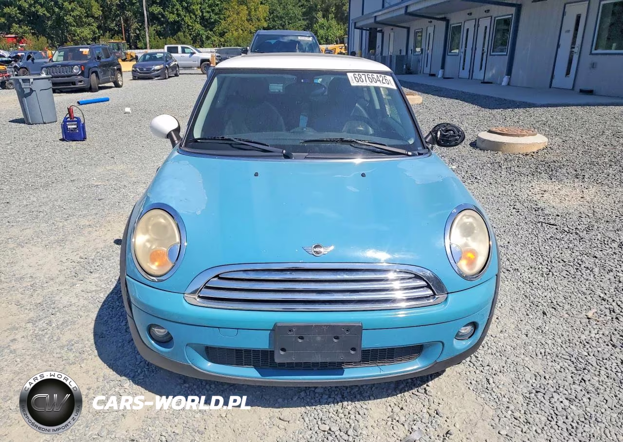2009 Mini Cooper VIN:WMWMF33559TU74835 - 5