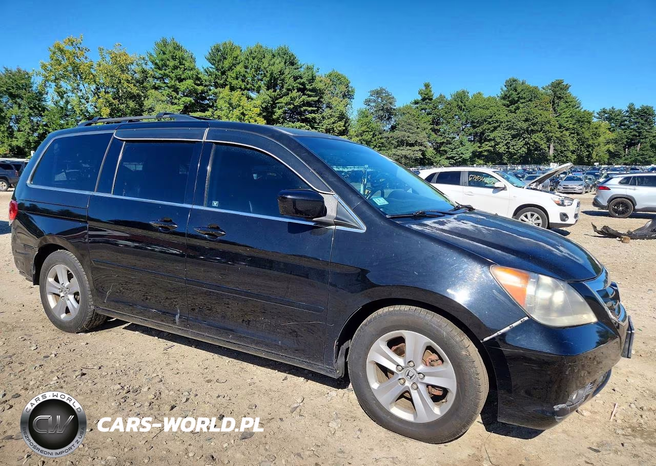 2010 Honda Odyssey Touring VIN:5FNRL3H94AB095457 - 4