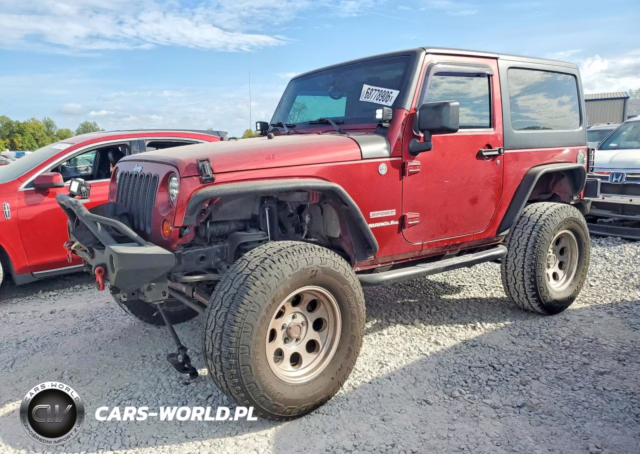 2011 Jeep Wrangler Sport VIN:1J4AA2D17BL531269 - 1