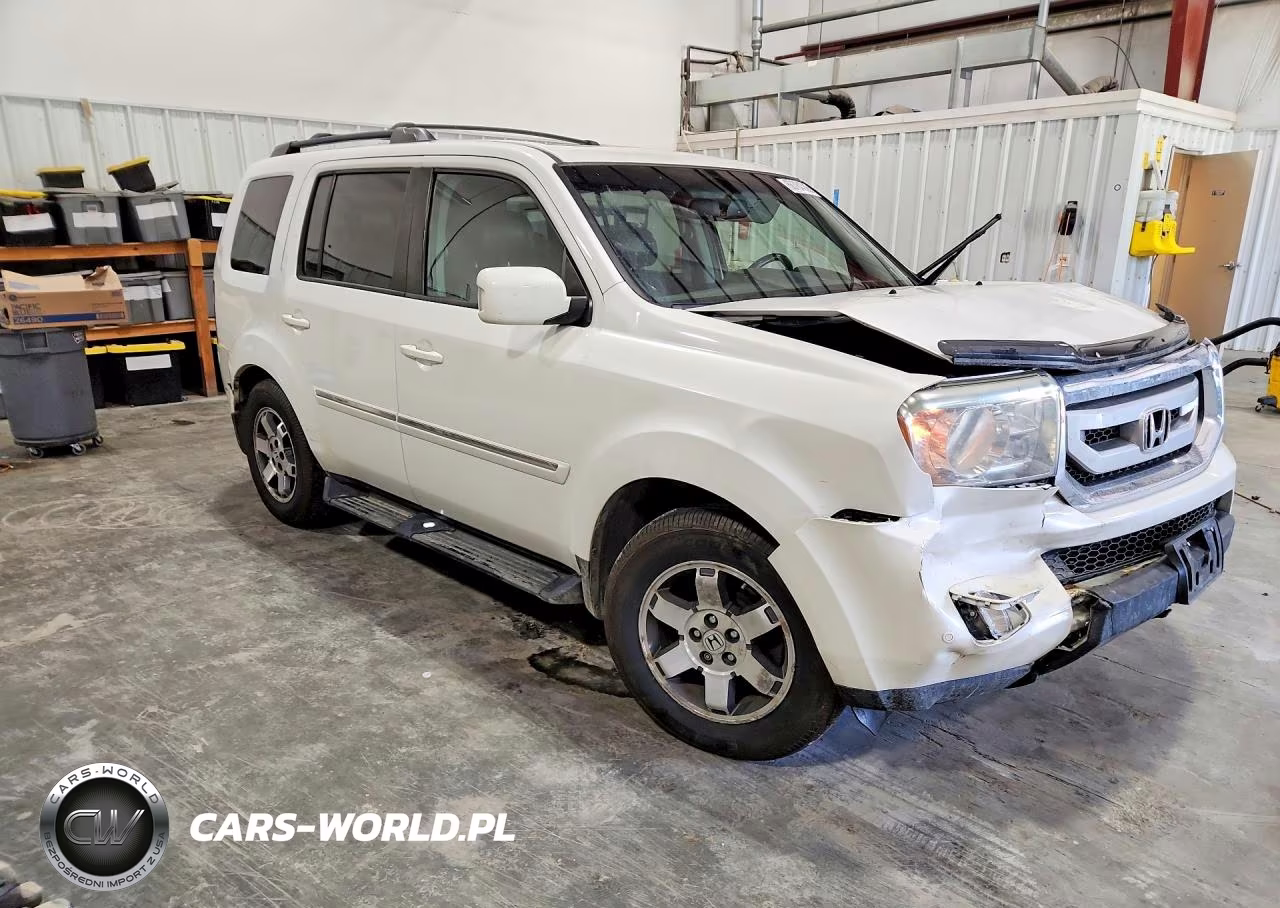 2011 Honda Pilot Touring VIN:5FNYF4H90BB010916 - 4