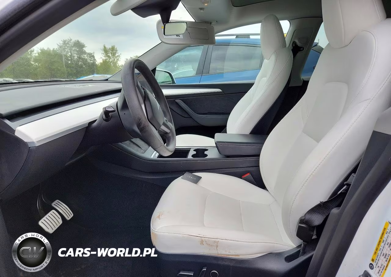 2023 Tesla Model Y VIN:7SAYGDEF3PF773899 - 7